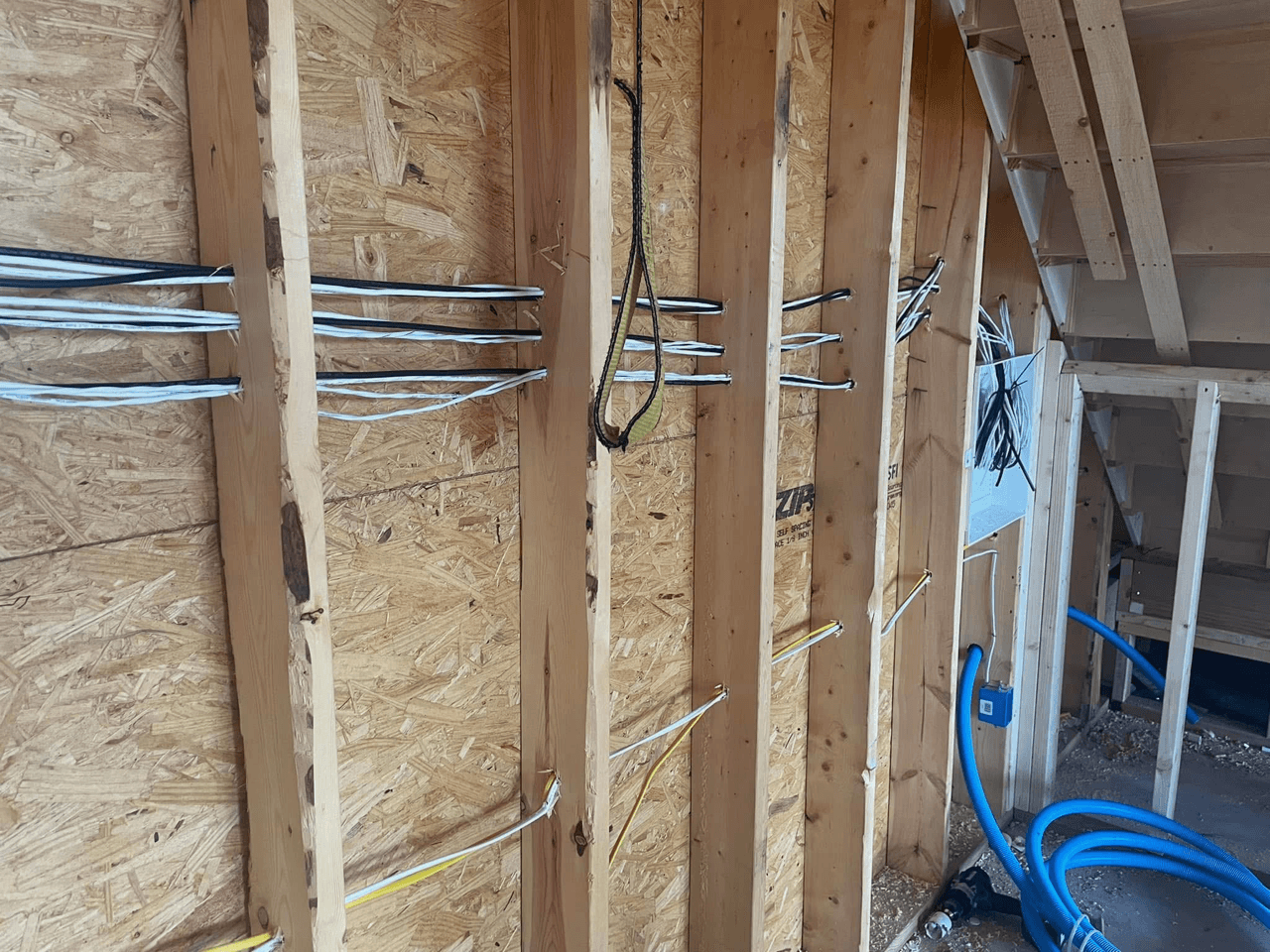 New construction prewire through wall framing