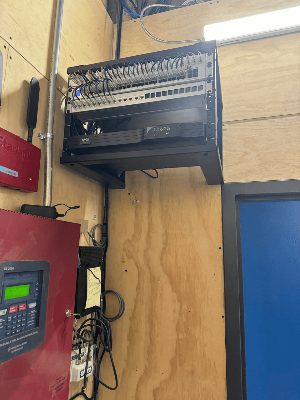 Commercial server rack with patch panel and switches